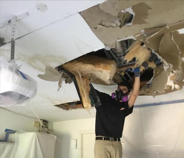 Water damaged ceiling in a garage